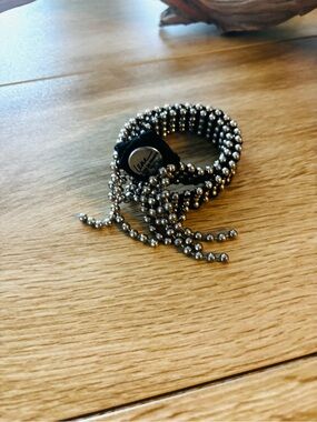 Double Wrap Beaded Metal Bracelet with Tassel Accent - Silver